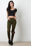 Mid-Rise Distressed Skinny Jeans